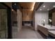 Elegant bathroom with double vanity and soaking tub at 705 Dragon Peak Dr, Henderson, NV 89012