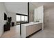Modern bathroom with a large vanity, walk-in shower, and spa-like feel at 705 Dragon Peak Dr, Henderson, NV 89012