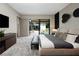 Bedroom with courtyard view and sitting area at 705 Dragon Peak Dr, Henderson, NV 89012