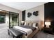 Spacious bedroom with private access to courtyard at 705 Dragon Peak Dr, Henderson, NV 89012