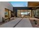 Private courtyard with gravel pathways, drought-tolerant landscaping, and views at 705 Dragon Peak Dr, Henderson, NV 89012