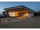 Modern home with sleek design, angular roofline, and landscaped entry at 705 Dragon Peak Dr, Henderson, NV 89012