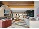 Spacious living area with fireplace, large sectional sofa, and city views at 705 Dragon Peak Dr, Henderson, NV 89012