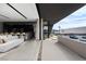 Spacious outdoor patio with comfortable seating and city views at 705 Dragon Peak Dr, Henderson, NV 89012