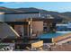 Luxury pool and spa with waterfall feature and mountain views at 705 Dragon Peak Dr, Henderson, NV 89012