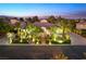 Luxury home with beautifully landscaped yard and outdoor lighting at 7840 Thunder Echo St, Las Vegas, NV 89131