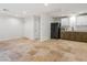 Spacious basement with kitchenette and tile flooring at 7840 Thunder Echo St, Las Vegas, NV 89131