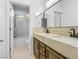 Modern bathroom with double vanity and shower/tub combo at 7840 Thunder Echo St, Las Vegas, NV 89131