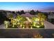 Beautiful single-story home with landscaped yard and night lighting at 7840 Thunder Echo St, Las Vegas, NV 89131