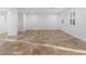 Spacious living room with large windows and tile flooring at 7840 Thunder Echo St, Las Vegas, NV 89131