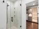 Spa-like shower with glass enclosure and built-in shelving at 7840 Thunder Echo St, Las Vegas, NV 89131