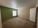 Spacious bedroom with large window provides natural light and neutral toned walls at 8441 Blue Island Ave, Las Vegas, NV 89129