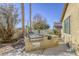 Outdoor kitchen and patio with built-in grill at 869 Ashford Way, Henderson, NV 89015
