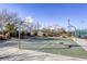 Outdoor basketball court with two hoops at 869 Ashford Way, Henderson, NV 89015