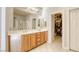 Bathroom boasts double vanity, walk-in shower, and large closet at 869 Ashford Way, Henderson, NV 89015