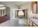 Bright breakfast nook features tile floors, and French doors leading to the backyard at 869 Ashford Way, Henderson, NV 89015