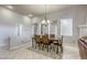 Bright dining room featuring a formal table and access to other rooms at 869 Ashford Way, Henderson, NV 89015
