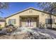 House exterior view showcasing patio and backyard access at 869 Ashford Way, Henderson, NV 89015
