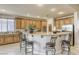 Large kitchen with an island, stainless steel appliances, and ample cabinetry at 869 Ashford Way, Henderson, NV 89015