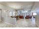 Spacious living room with a fireplace and leather furniture at 869 Ashford Way, Henderson, NV 89015
