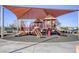 Modern playground with shade structure at 869 Ashford Way, Henderson, NV 89015