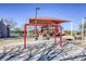 Swings and playground under shade at 869 Ashford Way, Henderson, NV 89015