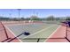 Two well-maintained tennis courts at 869 Ashford Way, Henderson, NV 89015