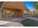 Covered patio with brick pavers and access to the house at 1327 Beehive Ln, Mesquite, NV 89034