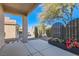 Covered patio with decorative screen and potted plants at 1954 High Mesa Dr, Henderson, NV 89012