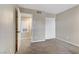 Bright bedroom with carpet flooring and closet at 201 Mission Laguna Ln # 105, Las Vegas, NV 89107