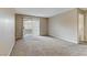 Living room with sliding door leading to patio at 201 Mission Laguna Ln # 105, Las Vegas, NV 89107