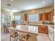 Spacious kitchen featuring an island, ample cabinetry, and modern appliances at 30 Fountainhead Cir, Henderson, NV 89052