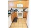 Well-equipped kitchen featuring granite countertops and wood cabinets at 3145 E Flamingo Rd # 1043, Las Vegas, NV 89121