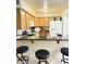 Kitchen boasts granite countertops and a breakfast bar at 3145 E Flamingo Rd # 1043, Las Vegas, NV 89121