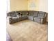Spacious living room with a large sectional sofa at 3145 E Flamingo Rd # 1043, Las Vegas, NV 89121