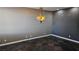 Dining room featuring neutral-colored walls, chandelier, and tile flooring at 3338 Commendation Dr, Las Vegas, NV 89117