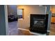 Living room with a gas fireplace and slate tile flooring at 3338 Commendation Dr, Las Vegas, NV 89117