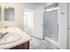 Bathroom with double sinks, a shower, and access to bedroom at 343 Burgos Ave, Las Vegas, NV 89030