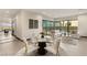 Elegant dining area with marble table and modern chairs at 36 Rainbow Point Pl, Henderson, NV 89011