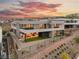 Modern home exterior with backyard and sunset view at 36 Rainbow Point Pl, Henderson, NV 89011