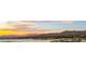 Panoramic lake and mountain views at sunset, luxury community at 36 Rainbow Point Pl, Henderson, NV 89011