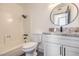 Bathroom with granite countertop vanity and bathtub at 4111 E Saint Louis Ave, Las Vegas, NV 89104