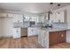 Updated kitchen featuring granite island and white shaker cabinets at 4111 E Saint Louis Ave, Las Vegas, NV 89104