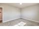 Spacious bedroom with carpet and access to hallway at 5100 Kansas Ave, Las Vegas, NV 89107