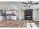 Open concept living room and kitchen with hardwood floors at 5100 Kansas Ave, Las Vegas, NV 89107