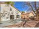 Spacious backyard with patio and partially fenced area at 5213 Tamanar Dr, Las Vegas, NV 89130