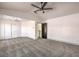 Spacious bedroom with vaulted ceiling and ceiling fan at 5213 Tamanar Dr, Las Vegas, NV 89130
