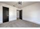 Spacious bedroom with new carpet and neutral walls at 5213 Tamanar Dr, Las Vegas, NV 89130