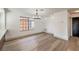 Bright dining room with hardwood floors and a chandelier at 5213 Tamanar Dr, Las Vegas, NV 89130
