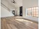 Living room with hardwood floors, fireplace and high ceilings at 5213 Tamanar Dr, Las Vegas, NV 89130